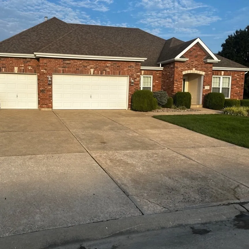 The same driveway clean and even after a full soft wash, O'Fallon